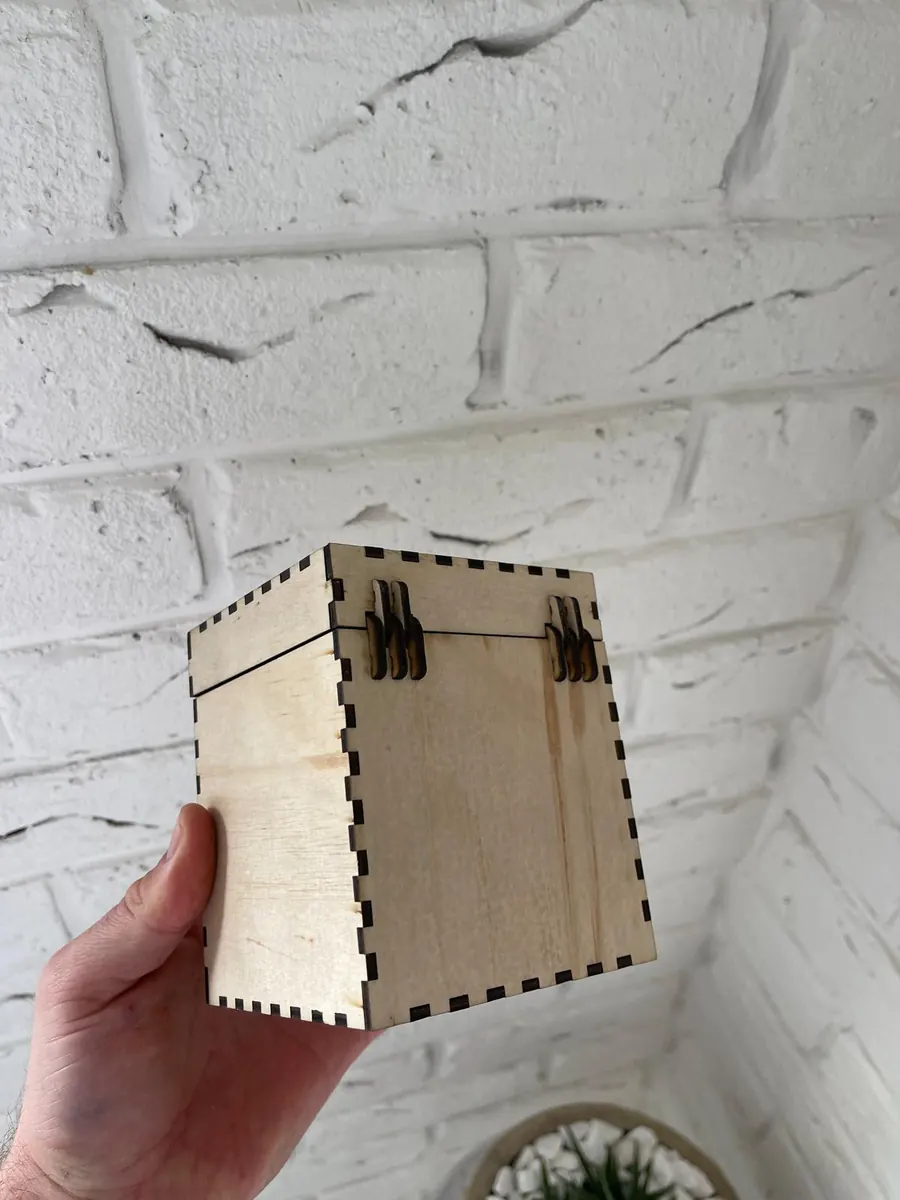 Laser cut plywood box with finger jointed corners and a cut timber hinge lid