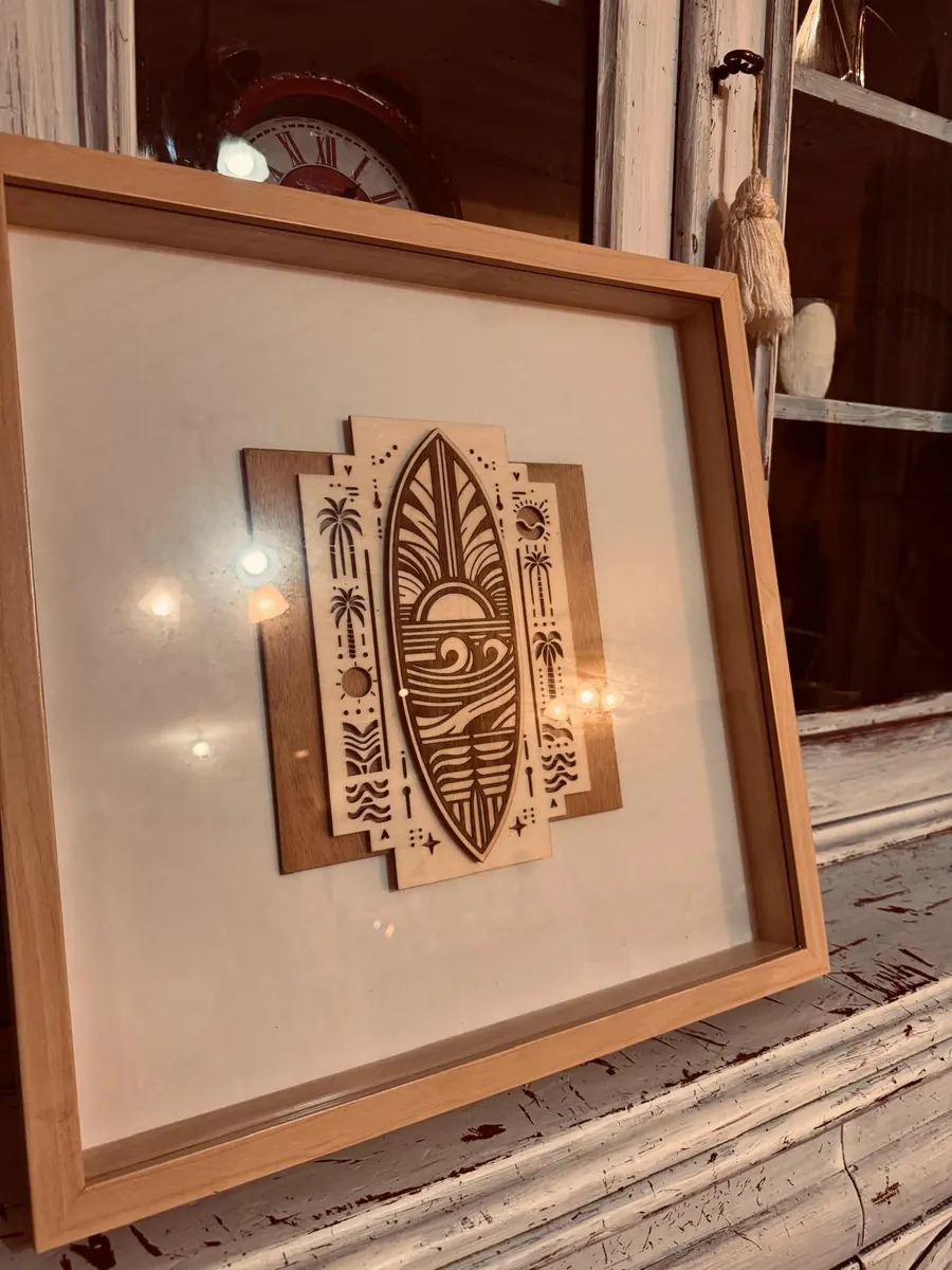 Framed laser cut art deco surfboard wall art with a stepped two-tone timber surround